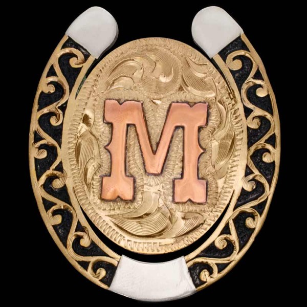 Our McLintock Bolo Tie is handcrafted on a Jeweler’s Bronze base and features a classic horseshoe design paired with Western-inspired scrollwork and our signature enamel finish. The bold center offers plenty of room to add your initial, Custom logo, Ranch